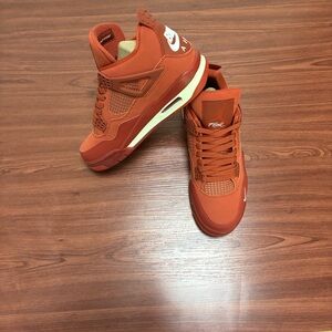 Air Jordan 4 Men's Bold
Red Sneakers